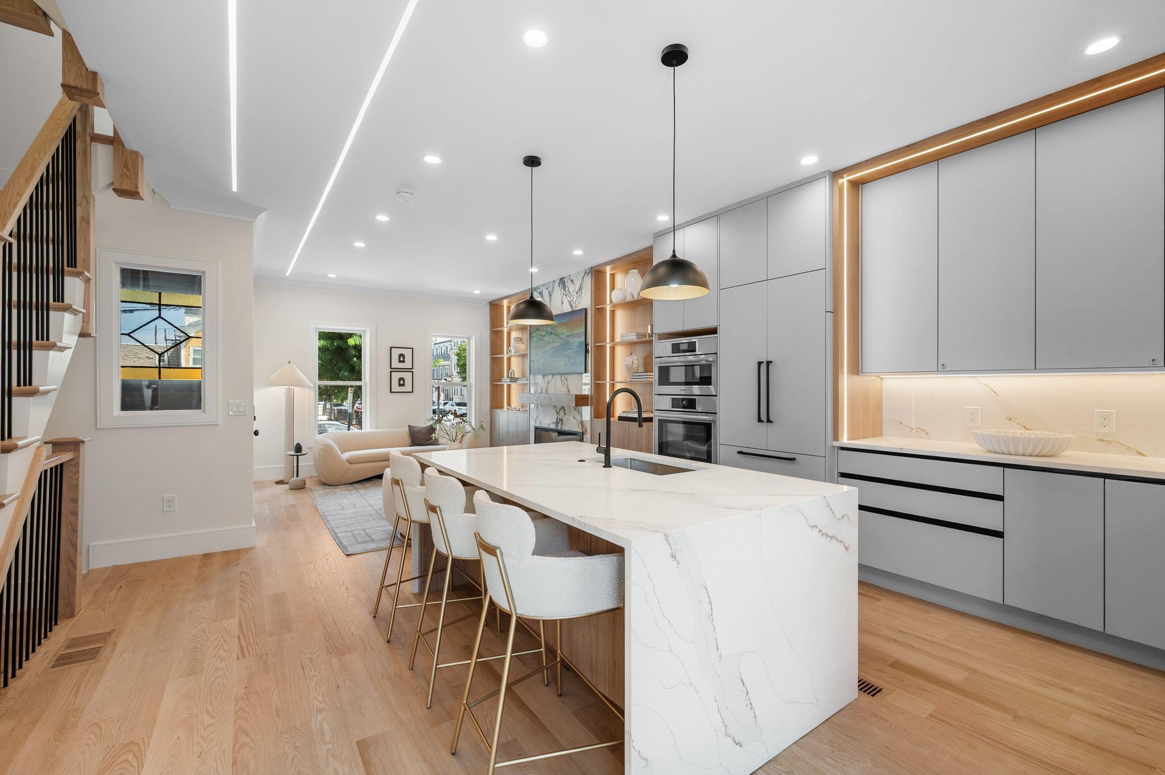 Kitchen and living area at South Boston Seaside Residence